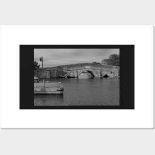 Stone bridge over the River Thurne in the village of Potter Heigham Posters and Art